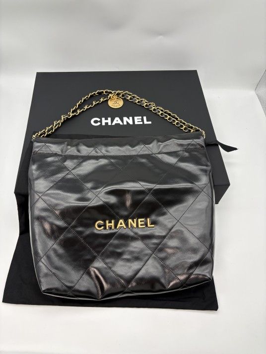 100% authentic Chanel 22 Small Handbag with Shiny Calfskin&Gold-Tone Metal in Black
