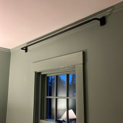 Brand new Pottery Barn Cast Iron Curtain Rods