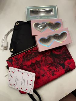 Red Floral Wristlet Clutch Bag with phone charger and lashes