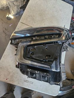 Chevy tahoe suburban left Headlight oem