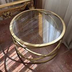 Glass top table gold