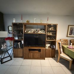 Solid Wood Entertainment Center With Glass Doors And Lighting