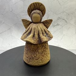 Beautiful vintage hand-sculpted clay pottery angel figurine possibly a "Honey and Me" primitive angel a brand known for its rustic and folk-art style.