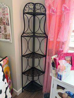 Wrought iron corner shelving piece