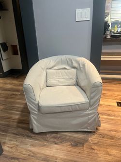 Arm chair with beige fabric cover