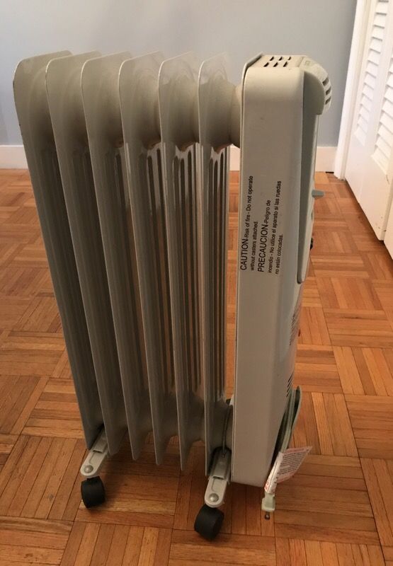 Space Heater Feature Comforts Electric Oil Filled Radiator