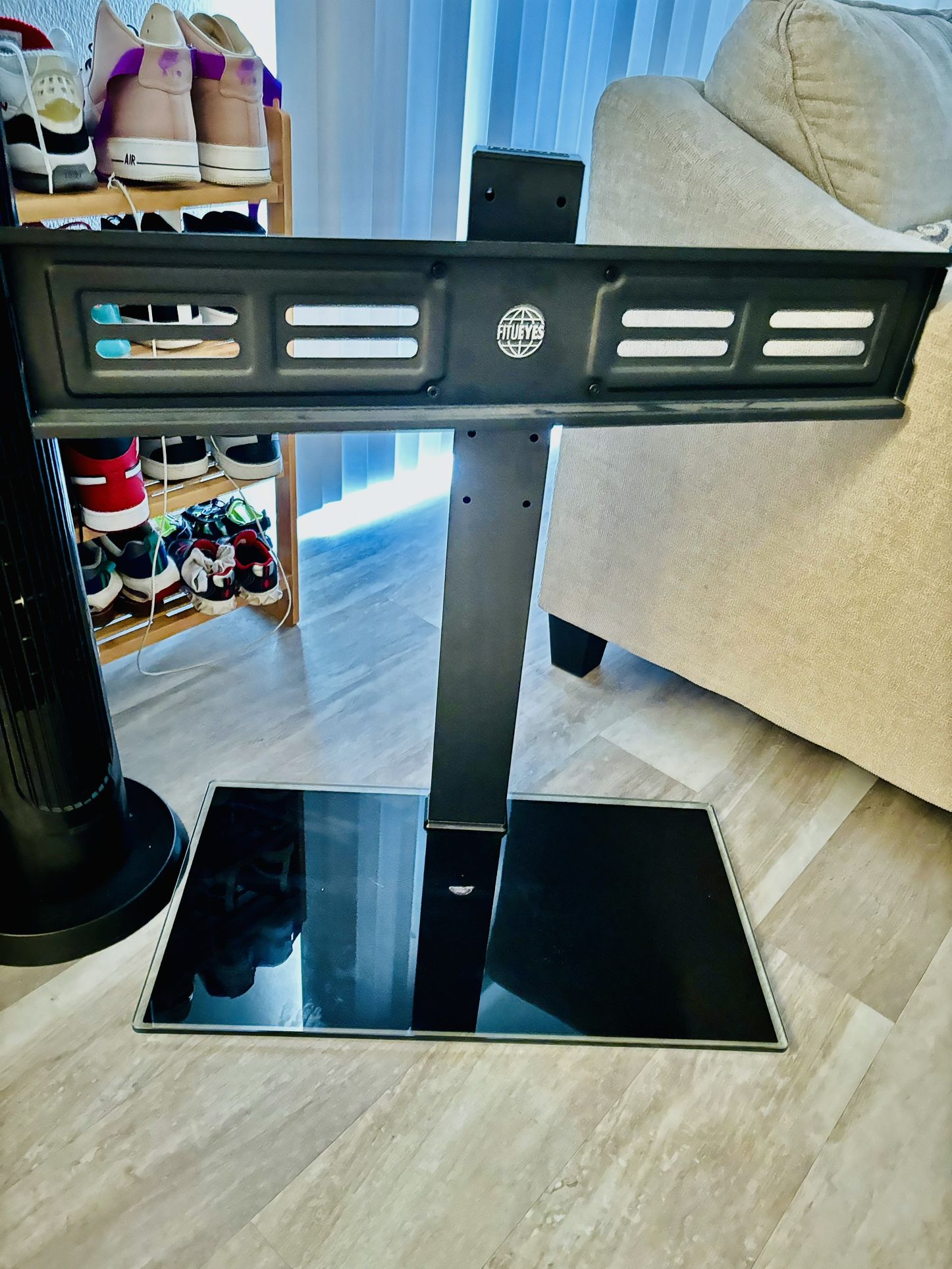 FITUEYES Universal TV Stand with Swivel Mount for 50-85 inch Flat Screens - Height Adjustable Tempered Glass Base