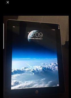 Apple iPad tablet with two cases