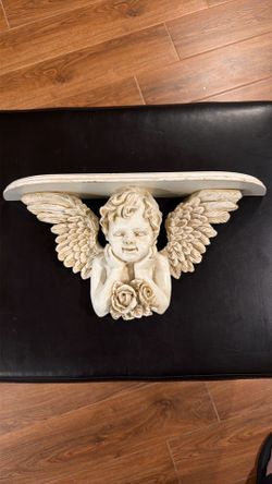 Angel wall shelf