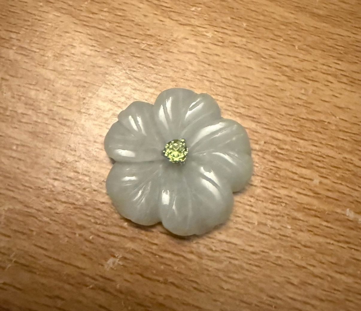 Jade authentic flower with centered stone $25