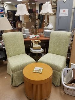 2 elegant fabric covered chairs