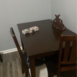 Large dining room table with four chairs solid