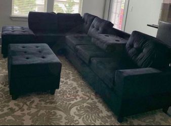 Black Fabric Reversible Sectional with Cup Holder and Storage Ottoman. Brand New.
