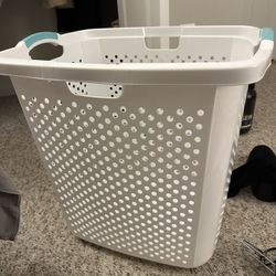 White plastic laundry basket