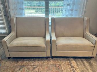 Pair of upholstered rocking chairs