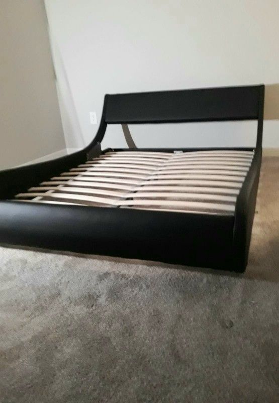 NEW KING UPHOLSTERED BED FRAME. Mattress sold separately