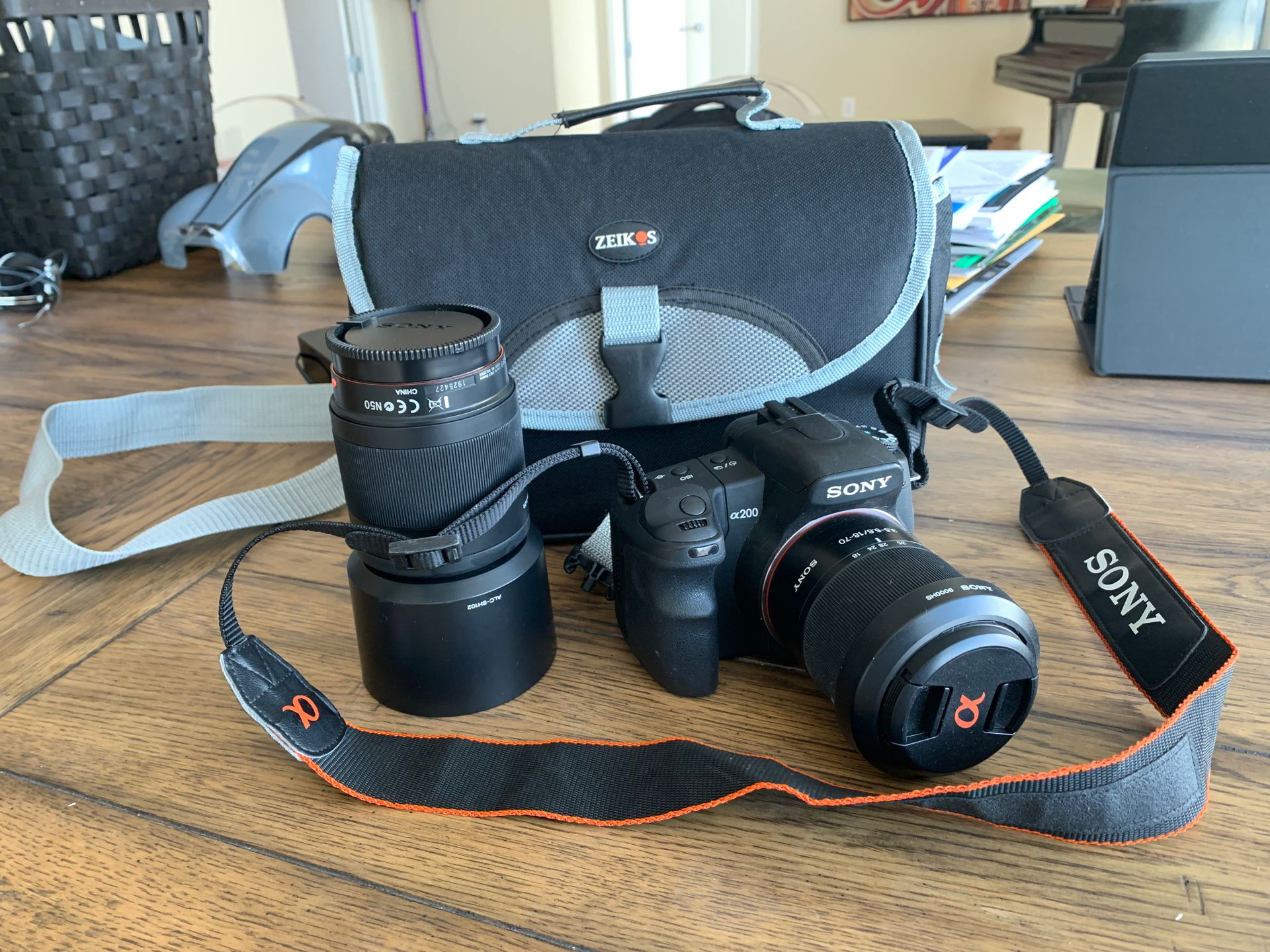 Sony alpha200 camera and additional 55-200 lens, camera bag