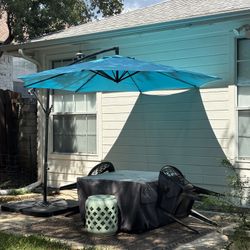 Aqua Offset Patio Umbrella + base, At Home Brand