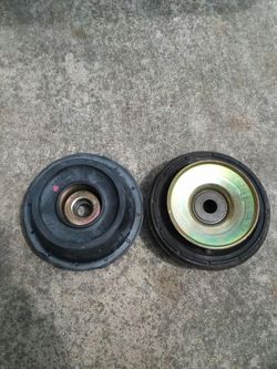 Upper strut bushing for a Volkswagen Passat