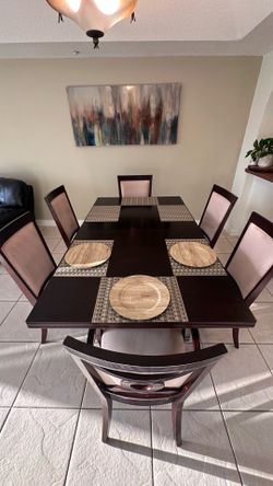 dining room with six chairs