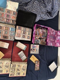 Yu-Gi-Oh cards, football cards, and baseball cards