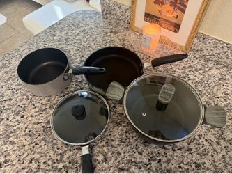 4 Assortment Sizes Pots and Pans with two lids - $40