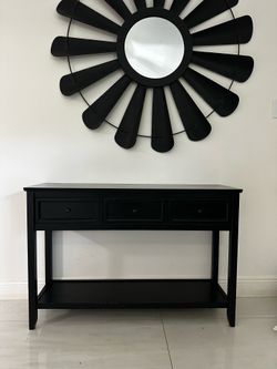 Black console table with mirror