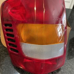 99-2002 Grand Cherokee Left rear Tail Light