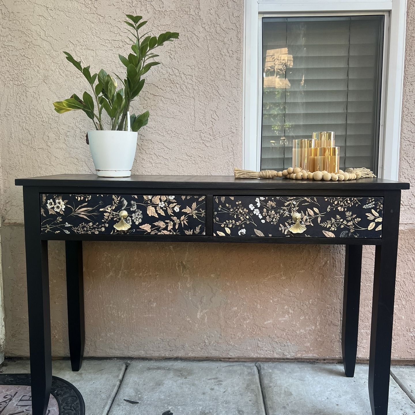 Refurbished black console table with Ginko leaf drawer knobs