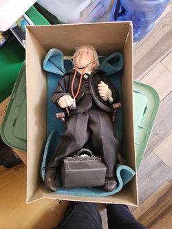 Norman rockwell character doll