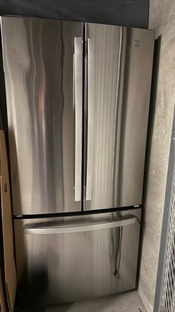 GE Refrigerator - Stainless Steel – Good Condition