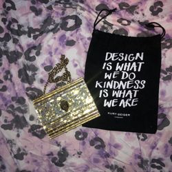 Elegant Gold Sequin Clutch with Chain Strap – Kurt Geiger London