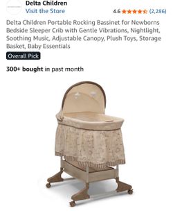 Delta children portable rocking bassinet