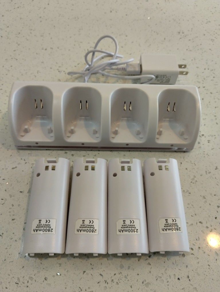 Brand New Four Pack Rechargeable Wii Batteries With Charging Station
