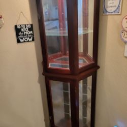 Cherry Wood Corner Lighted Curio Cabinet. 