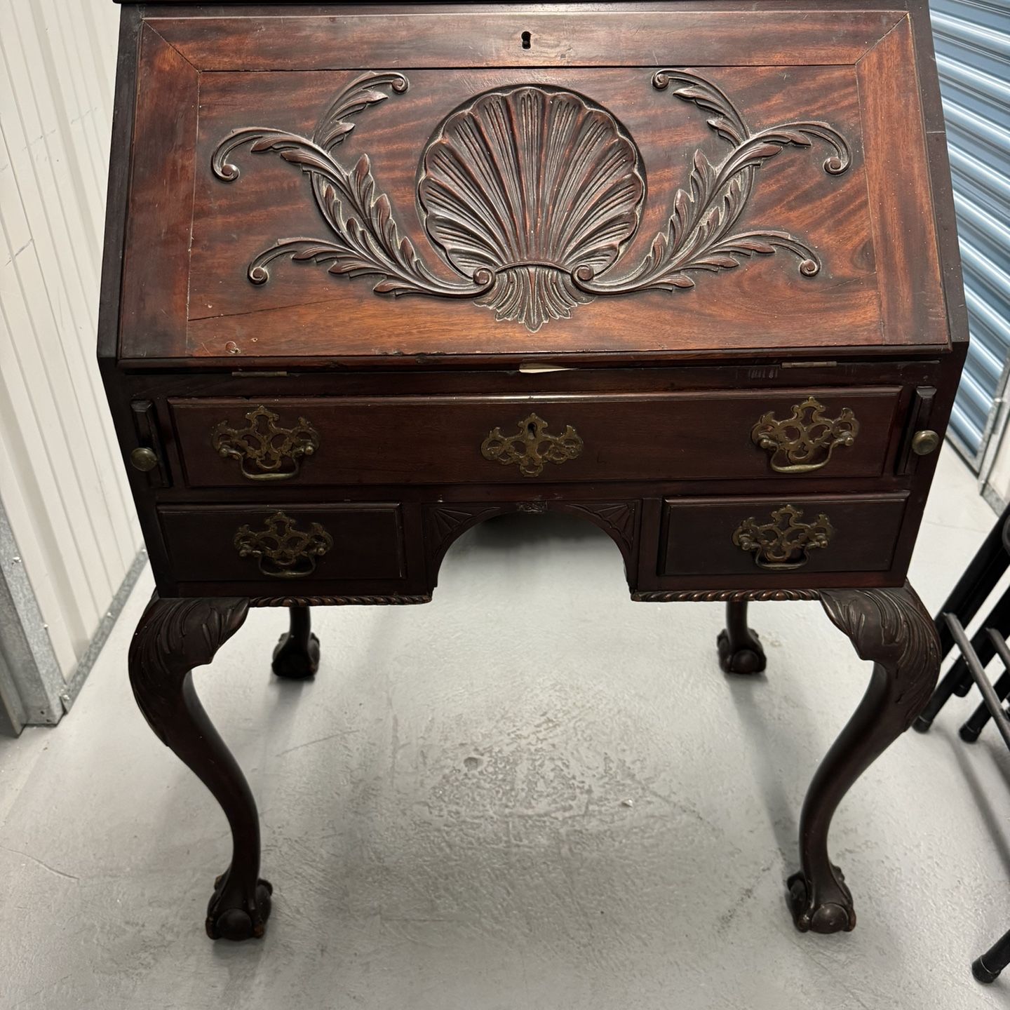 An American Chippendale style slant front writing desk