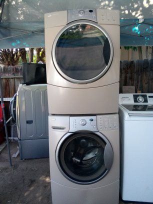 Kenmoore frontloads set washer and dryer both electric with warranty