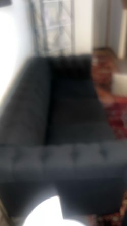 2 sets of dark grey couches (3 big cushions on each)