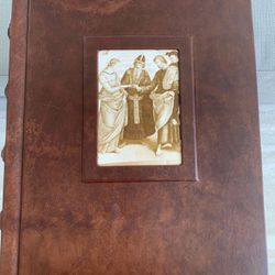 So Unique! Brown, leather bound 50 page scrapbook. Each page has a paper protective covering for items for the book. Never used Great condition. 