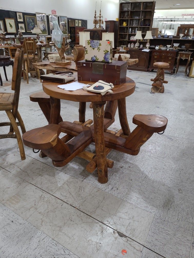 Handmaid teak bar table with flip up bar stools