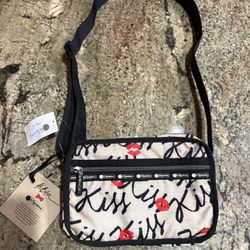 NEW Lesportsac Alber Elbaz Big Kiss Cross Body Bag Purse 9"x6"x3 The strap is 22" drop