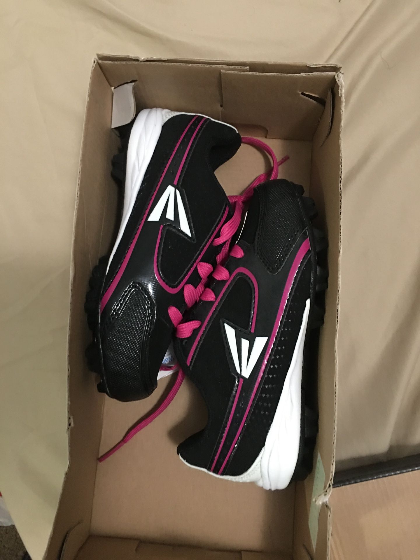 Brand new never used girls softball cleats size 13