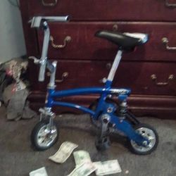 A Clock Ring And A Mini Stunt Bike