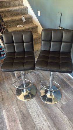 Two black barstools