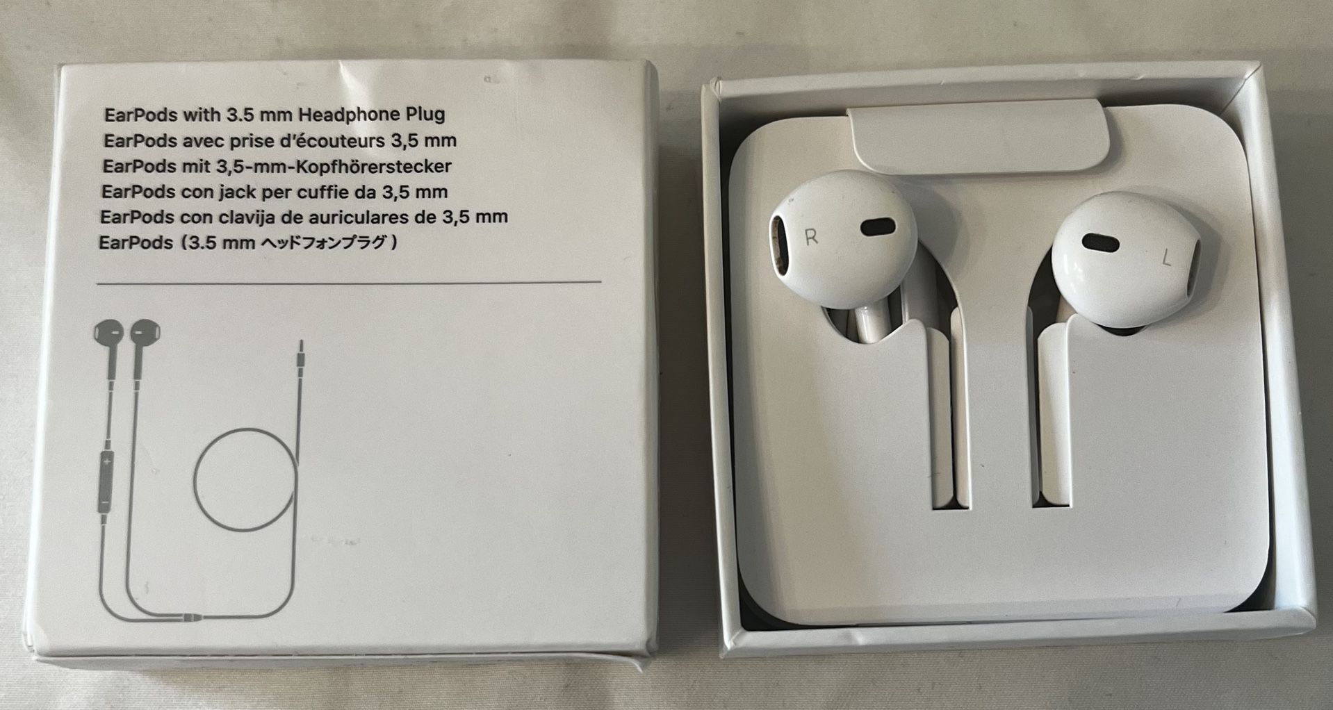 Apple EarPods Headphones with 3.5mm Plug, Wired Ear Buds with Built-in Remote to Control Music, Phone Calls, and Volume