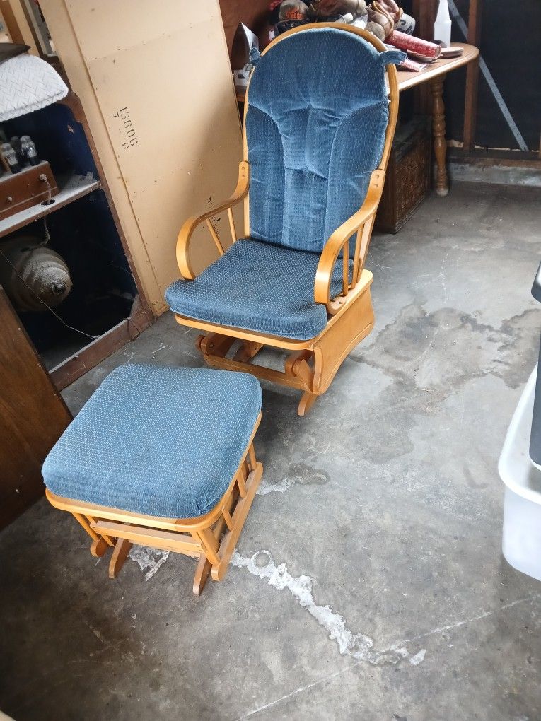 Old Rocking Chair With Rocking Foot Rest And An Old Desk