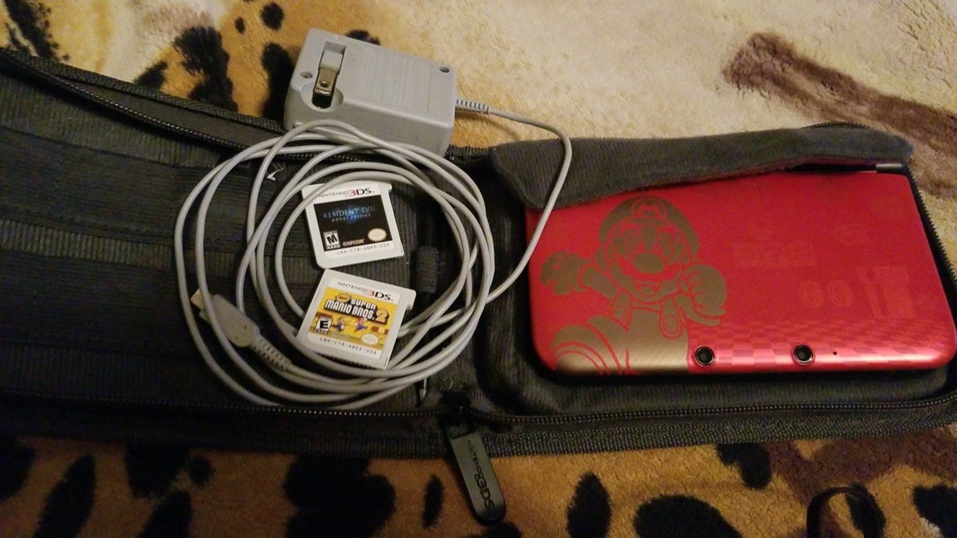 Nintendo 3DS XL with two games and case