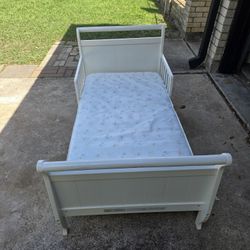 Delta Children Wood Sleigh Toddler Bed, White