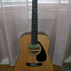 Yamaha guitar with case, literally new, never used it.