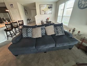 Ashley brand 3 piece sofa set with ottoman